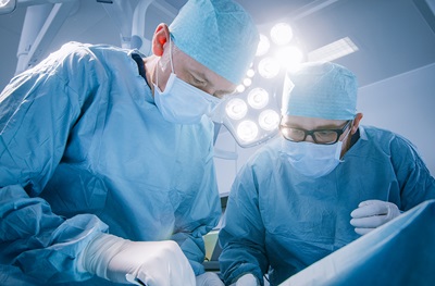 surgeons performing surgery